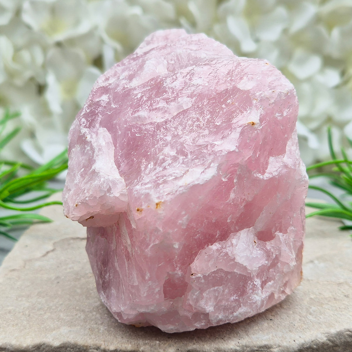 Natural Rose Quartz crystal to display in your home. Promotes calm, self-love, and emotional balance while bringing harmony to your space.