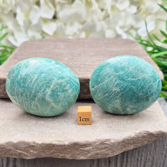 Polished Amazonite galets with calming, balanced energy. Ideal for easing stress, open communication, and supportive everyday use. 