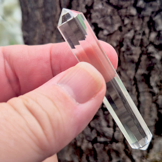 Mini 12-sided quartz wand, Vogel-style double terminated point. Known for focus, clarity and directing energy in meditation or energy work. 
