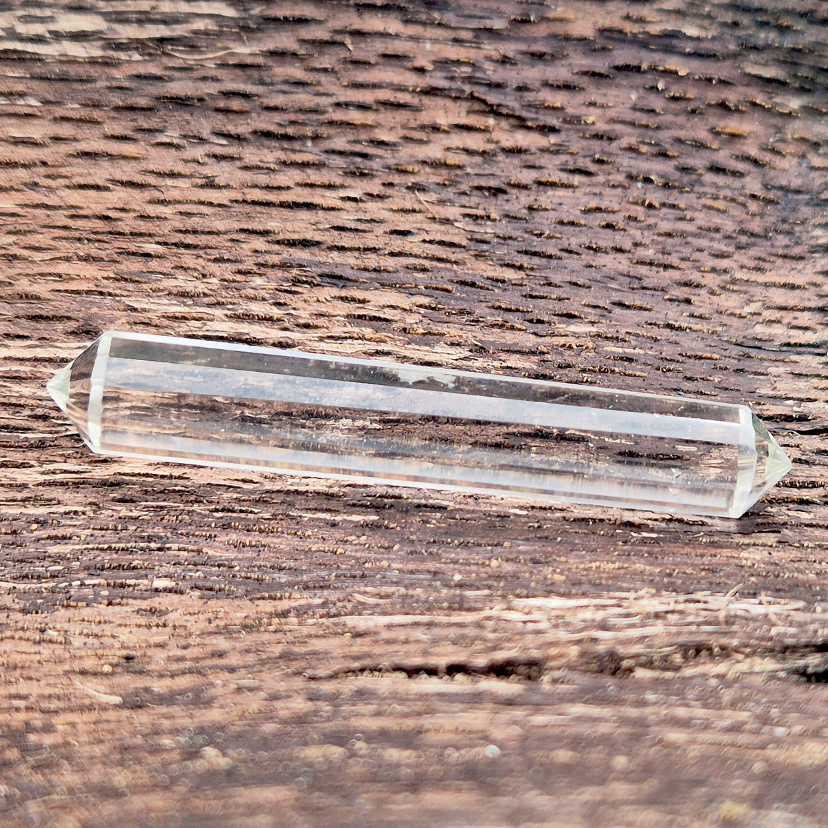 Mini 12-sided quartz wand, Vogel-style double terminated point. Known for focus, clarity and directing energy in meditation or energy work. 