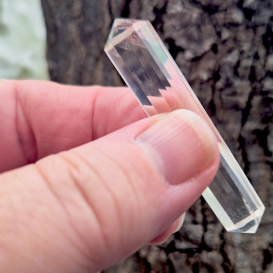 Mini 12-sided quartz wand, Vogel-style double terminated point. Known for focus, clarity and directing energy in meditation or energy work. 