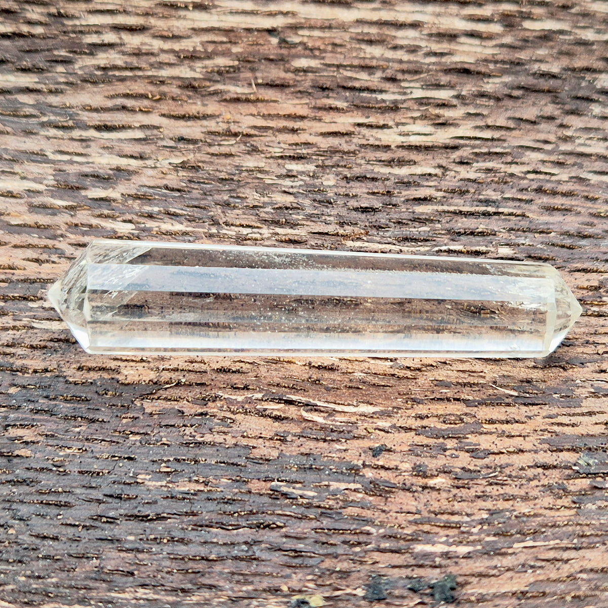 Mini 12-sided quartz wand, Vogel-style double terminated point. Known for focus, clarity and directing energy in meditation or energy work. 