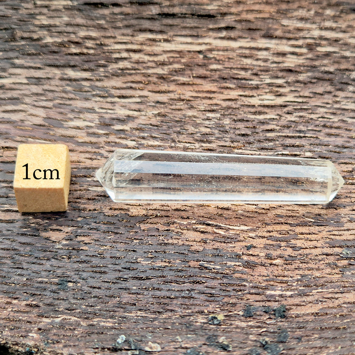 Mini 12-sided quartz wand, Vogel-style double terminated point. Known for focus, clarity and directing energy in meditation or energy work. 