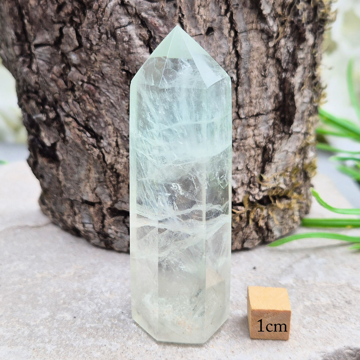 Green Fluorite tower with six-sided generator tip. Supports focus, balance, and mental clarity. A calming crystal for your space or collection. UK home decor.
