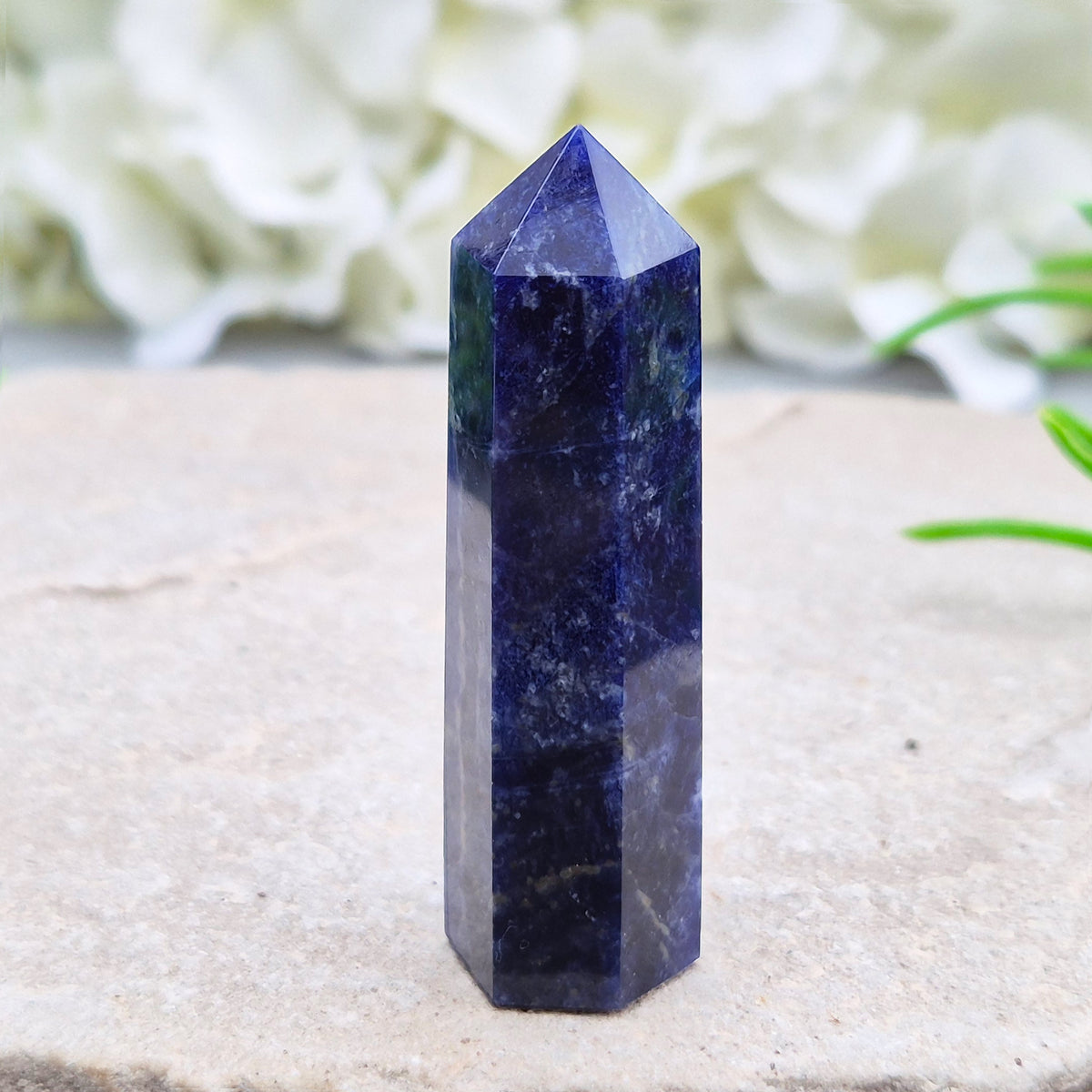 Sodalite Point – Inspires clarity, balance & confidence. Ideal for focus, reflection & crystal collections. Beautiful deep blue hues. A grade.