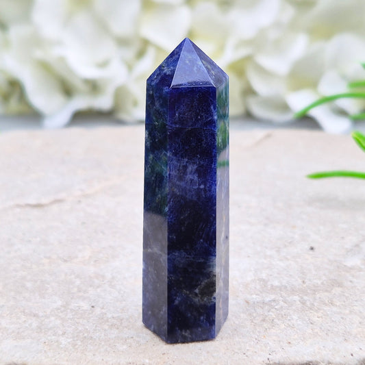 Sodalite Point – Inspires clarity, balance & confidence. Ideal for focus, reflection & crystal collections. Beautiful deep blue hues. A grade.