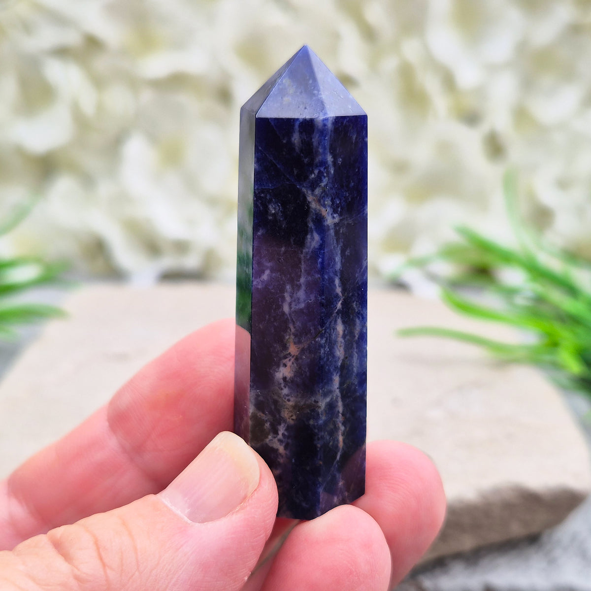 Sodalite Point – Inspires clarity, balance & confidence. Ideal for focus, reflection & crystal collections. Beautiful deep blue hues. A grade.