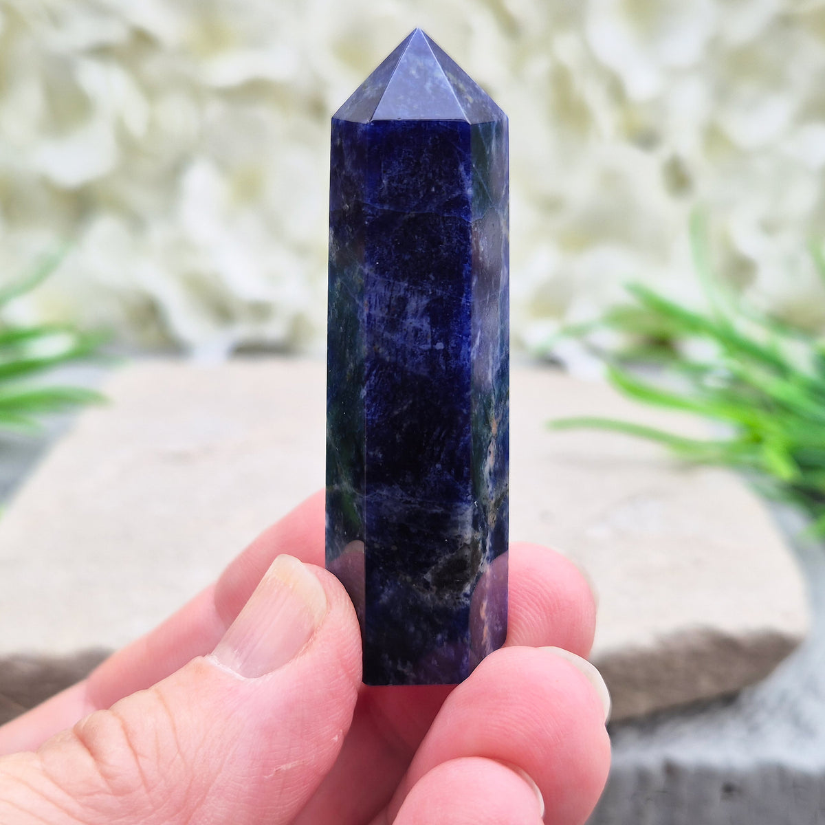 Sodalite Point – Inspires clarity, balance & confidence. Ideal for focus, reflection & crystal collections. Beautiful deep blue hues. A grade.