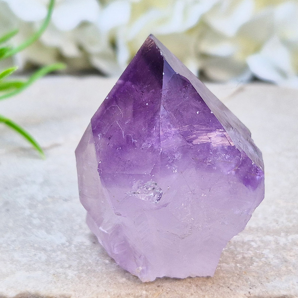 Amethyst standing point with rich purple tones, ideal for creating a calm, grounded space. A striking piece for display, meditation, or everyday energy support.