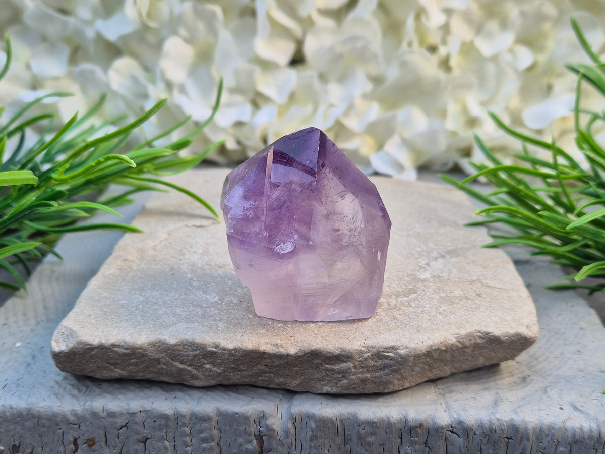 Amethyst standing point with rich purple tones, ideal for creating a calm, grounded space. A striking piece for display, meditation, or everyday energy support.