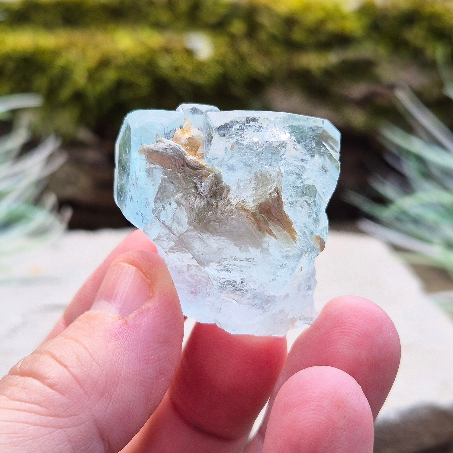 Aquamarine, A grade from India. Lovely pale aqua blue colouring. Hexagonal gemmy crystal with good colour and clarity. Also has some Mica on the back.

weight - 32 gm, length - 3.2 cm at longest, width - 3.2 cm at widest, depth - 2 cm at thickest