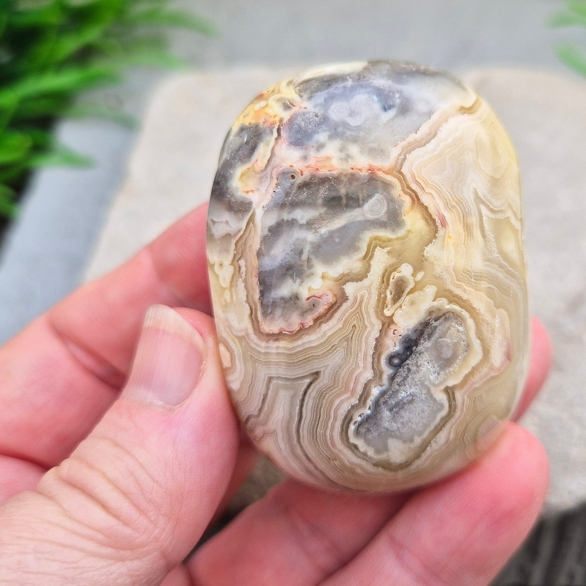 Crazy Lace Agate palm stone—vibrant, swirling patterns for joy, balance & stability. A stone of laughter & positivity. Smooth, soothing & one of a kind.