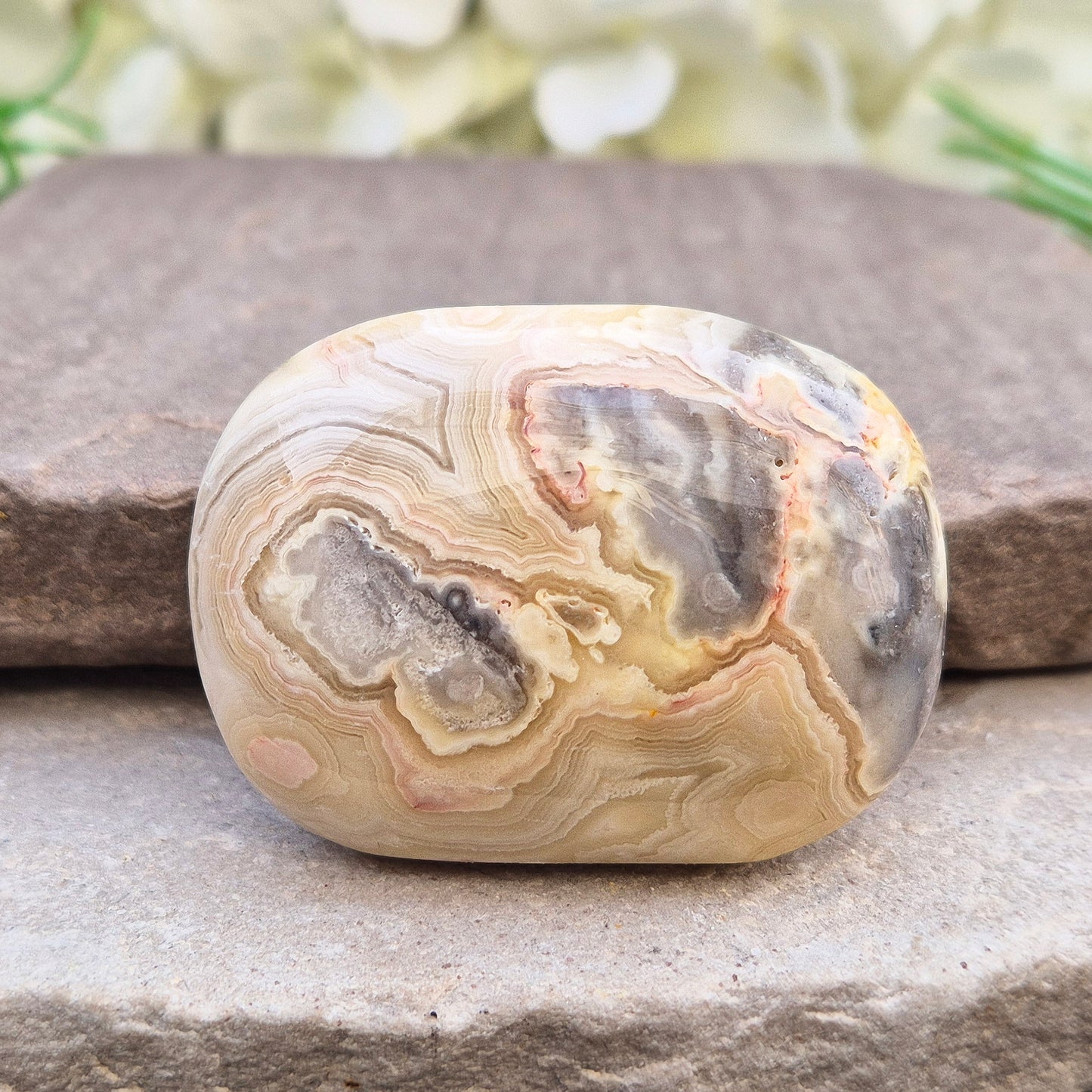 Crazy Lace Agate palm stone—vibrant, swirling patterns for joy, balance & stability. A stone of laughter & positivity. Smooth, soothing & one of a kind.