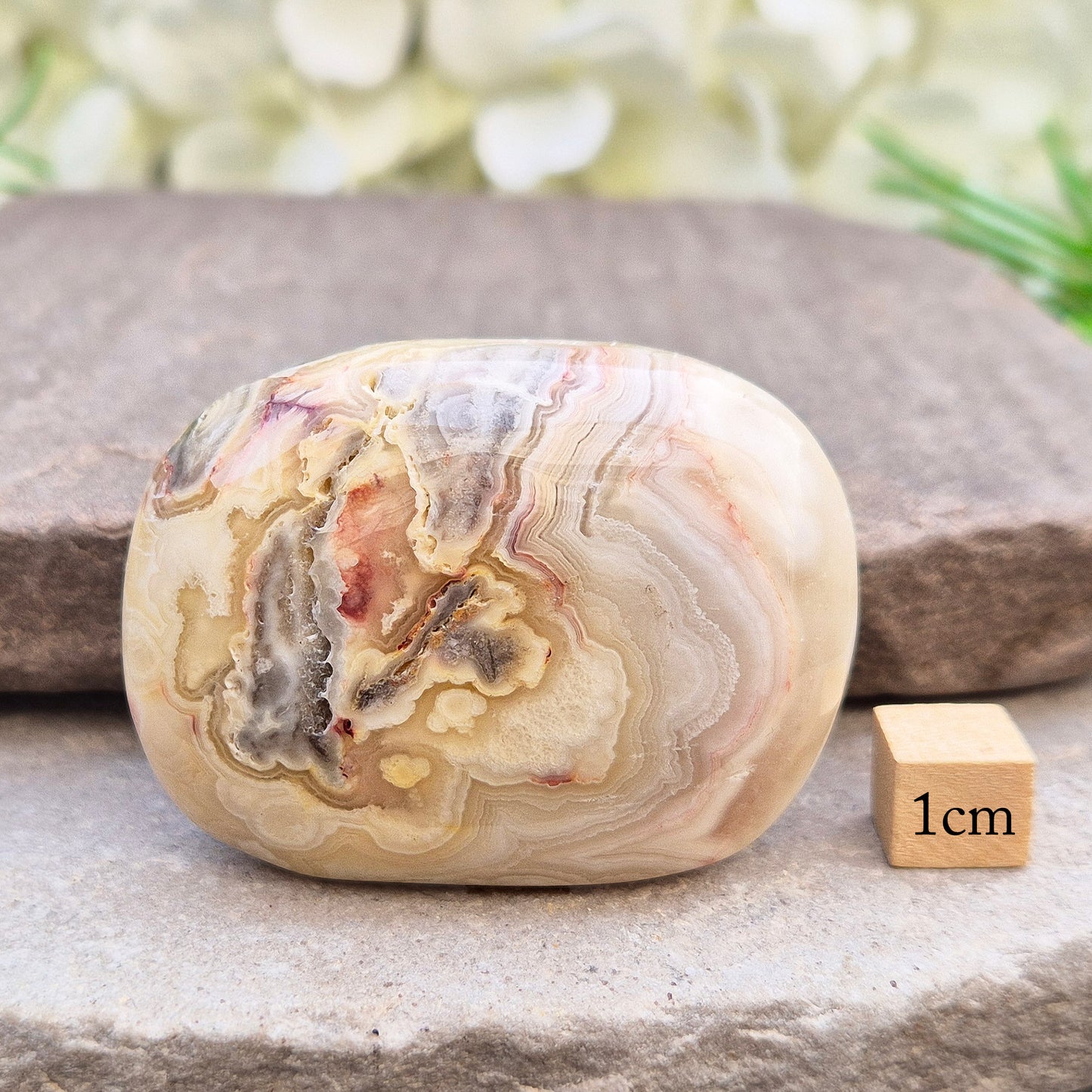 Crazy Lace Agate palm stone—vibrant, swirling patterns for joy, balance & stability. A stone of laughter & positivity. Smooth, soothing & one of a kind.