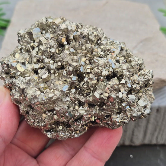 Natural pyrite crystal cluster from Peru featuring defined cubes & rich gold lustre. A striking, light-catching piece for home decor, desks, or crystal lovers.