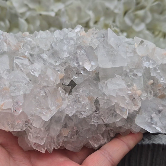 Natural Apophyllite crystal cluster from India, known for its calm, uplifting presence. A beautiful display piece often chosen for reflection and spiritual spaces.