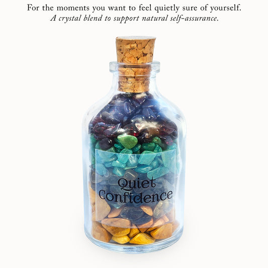 Quiet Confidence crystal blend bottle with garnet, jasper, amazonite and labradorite. A grounding decorative piece for calm self-assurance and composed communication.
