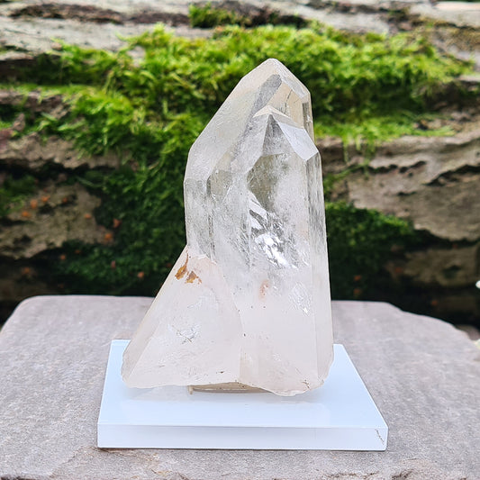 Madagascan Quartz Cluster with 2 points growing along side each other, I will include a clear acrylic stand and some tac so you can stand it up.