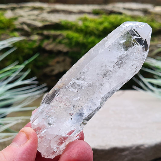 Natural Faden Quartz from La Belleza Mine, Santander, Columbia. Faden Quartz is a quartz crystal which has fractured during its growth and healed again.